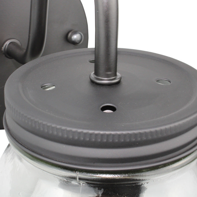 Schwarzer Jar Shade Wandbeleuchtung Industrie Klar Glas 1 Licht Schlafzimmer Wandleuchte mit Blumenstruktur