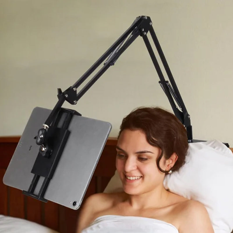 Versteckter Telefon-/Tablethalter am Bett