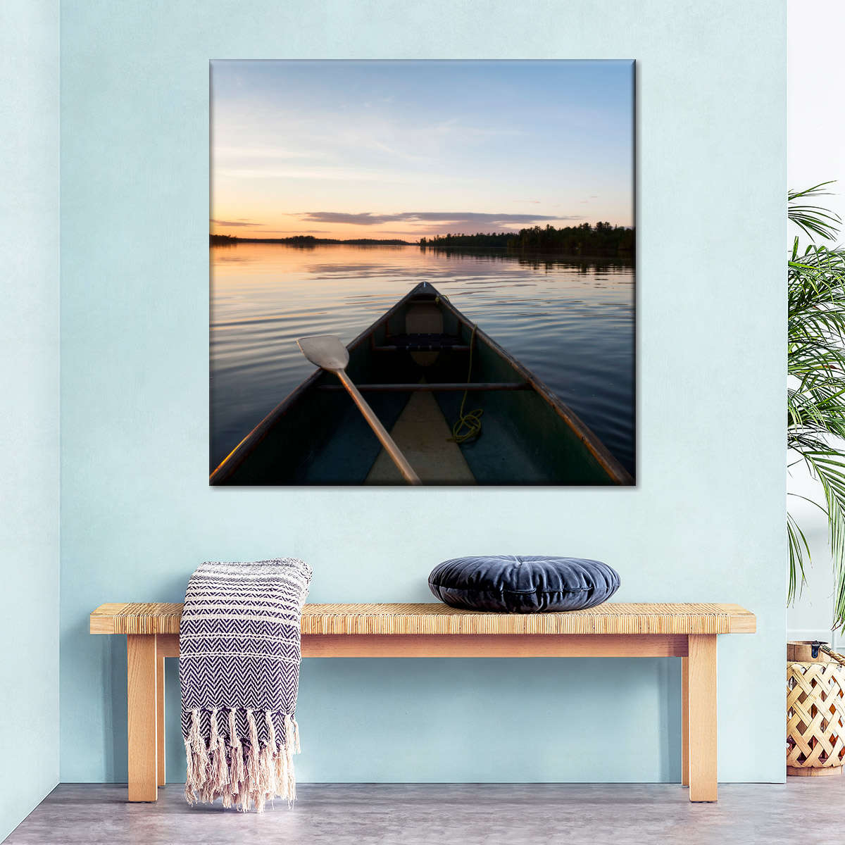 Sandsberg | Boot und Paddel an einem ruhigen See bei Sonnenuntergang Wandkunst
