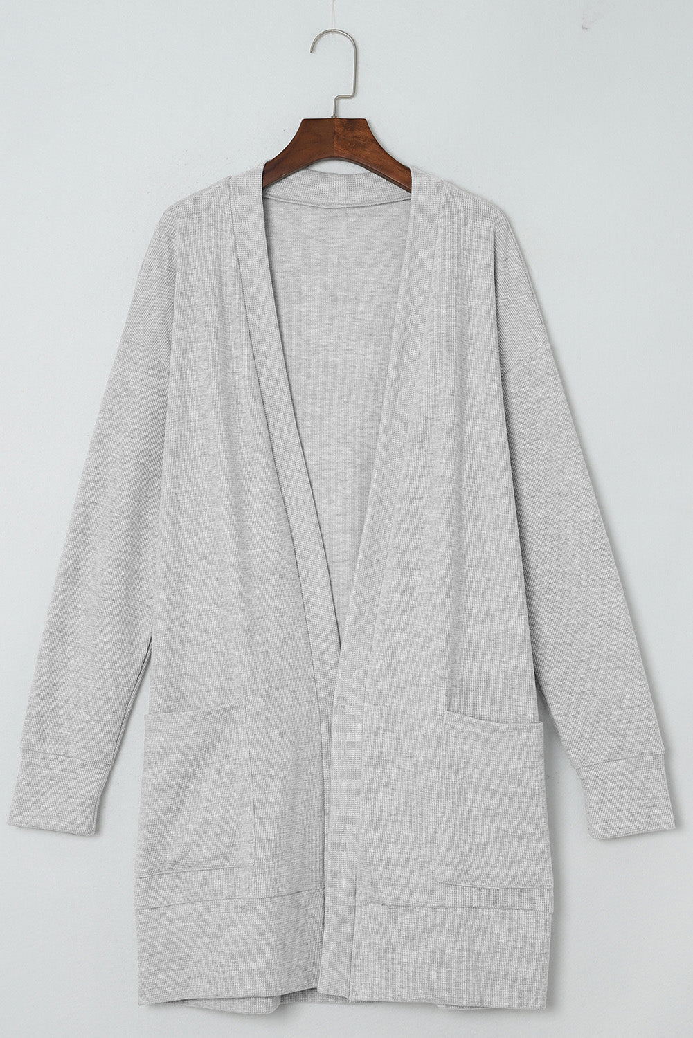 Schwarzer gerippter Strick cardigan mit offenen Vorderseite und Taschen