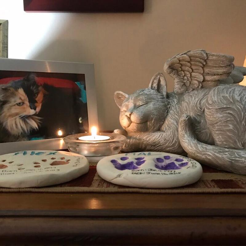 Engel Hund und Katze Statue