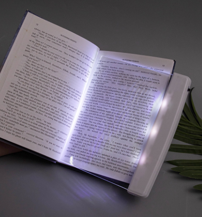 Leselampe aus Plexiglas mit LED und Lesezeichen