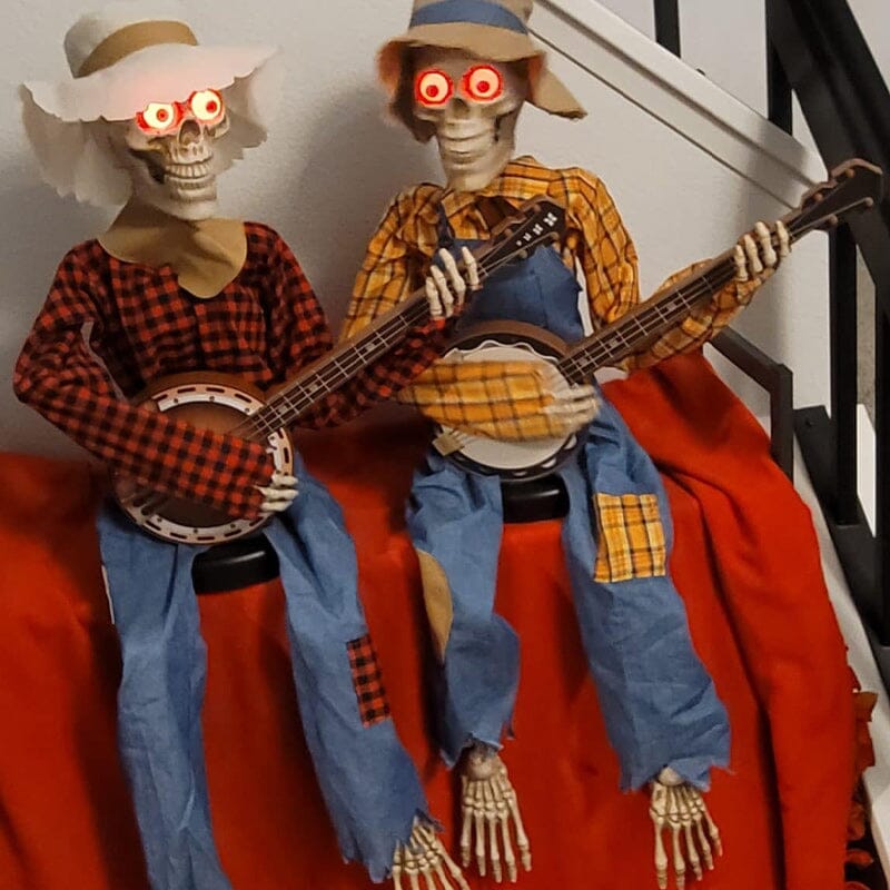Lustiges animiertes duellierendes Banjo-Skelett