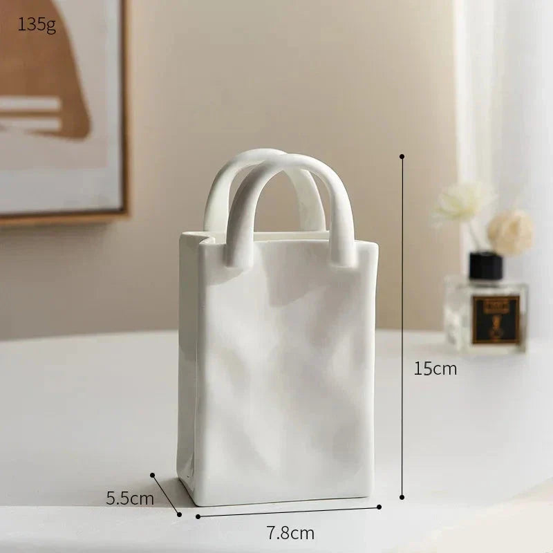 Einfache dekorative Handtaschenvase