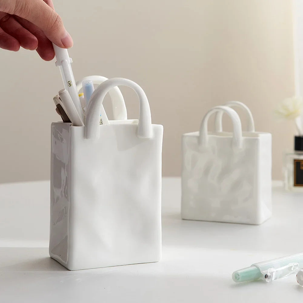 Einfache dekorative Handtaschenvase