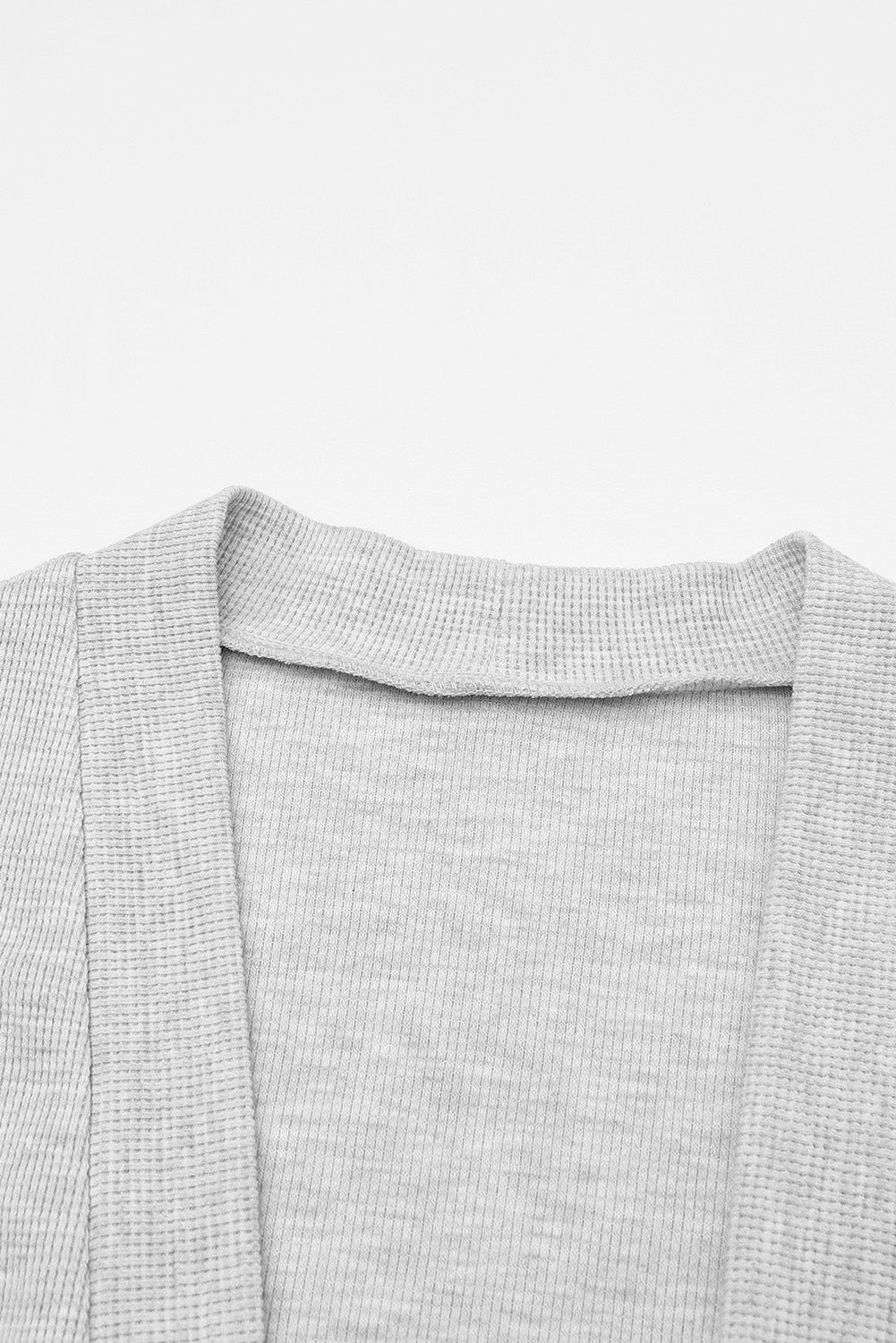 Schwarzer gerippter Strick cardigan mit offenen Vorderseite und Taschen