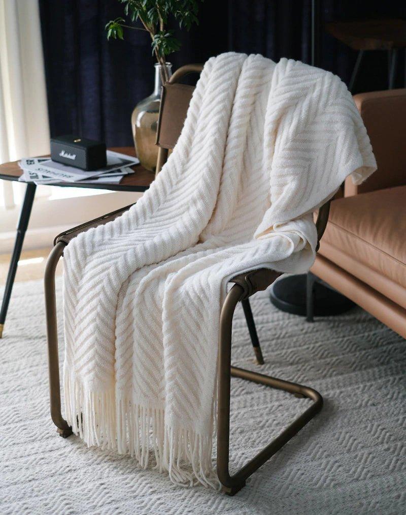 Boon – Gestrickte Überwurfdecken aus Tweed mit Zickzack-Struktur und Quasten