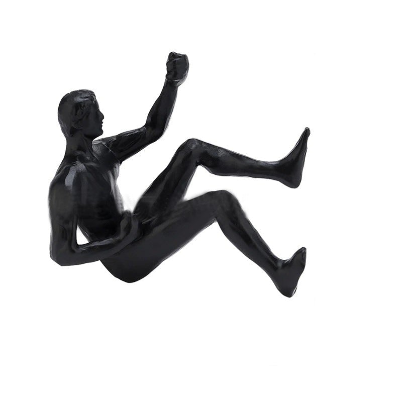 Sandsberg | Kletterwand Hängende Statuen