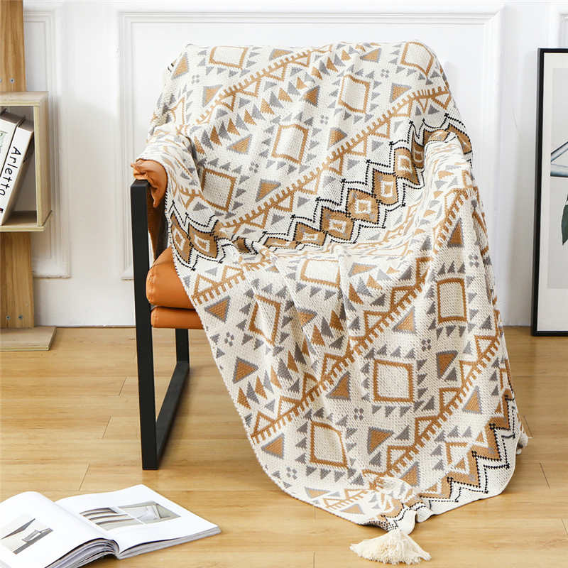 Gemütliche Strickdecke mit Quastenmuster