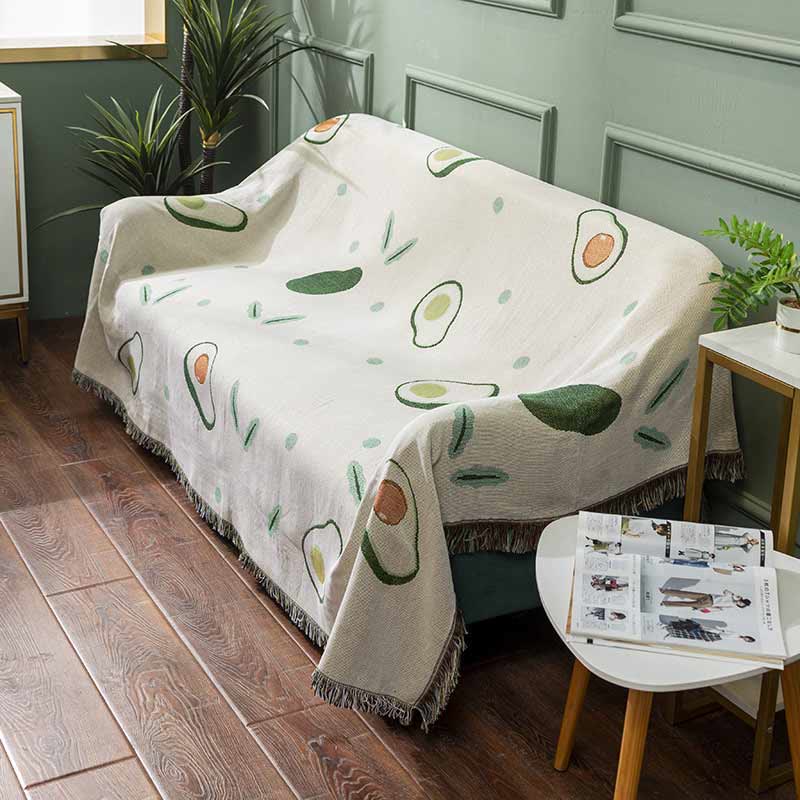 Decke mit Avocado-Print und Quaste