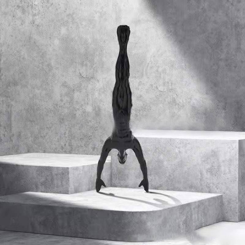 Sandsberg | Kletterwand Hängende Statuen