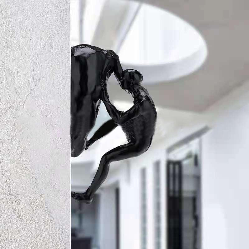 Sandsberg | Kletterwand Hängende Statuen