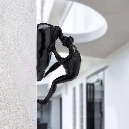 Sandsberg | Kletterwand Hängende Statuen