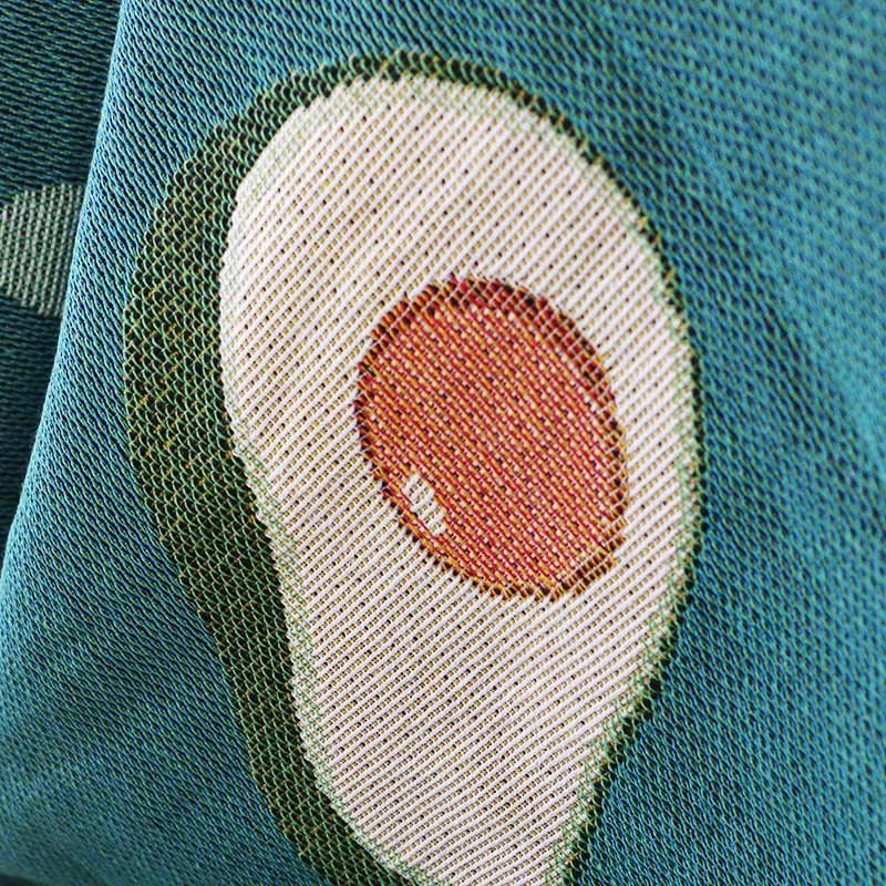 Decke mit Avocado-Print und Quaste