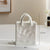 Einfache dekorative Handtaschenvase