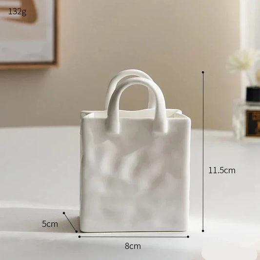 Einfache dekorative Handtaschenvase