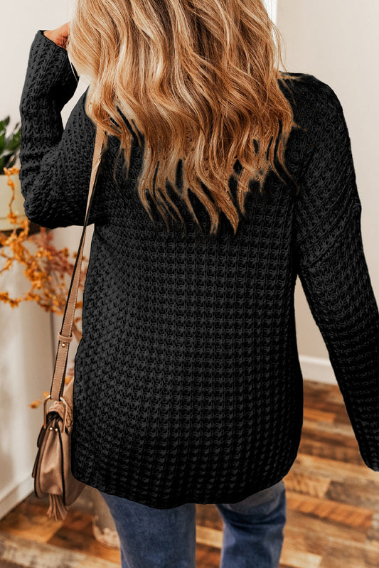 Schwarzer gestrickter V-Ausschnitt locker sitzender Pullover