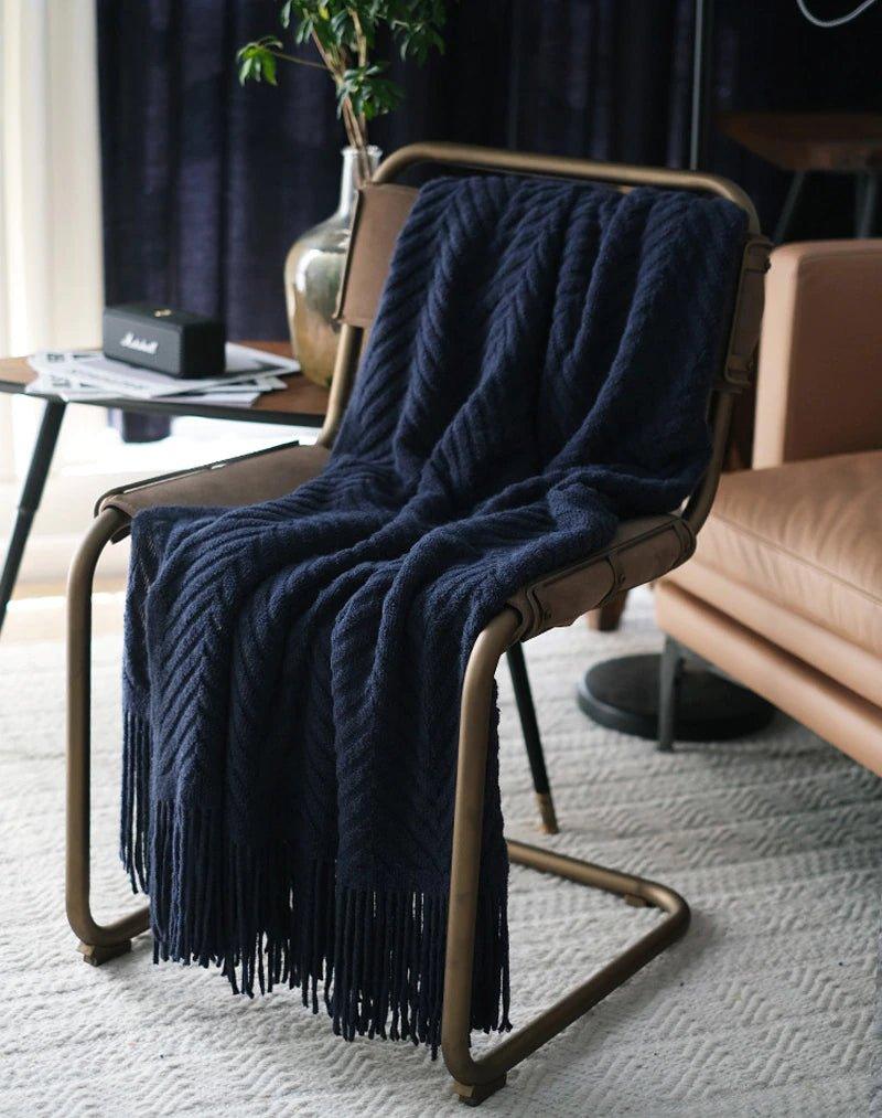 Boon – Gestrickte Überwurfdecken aus Tweed mit Zickzack-Struktur und Quasten