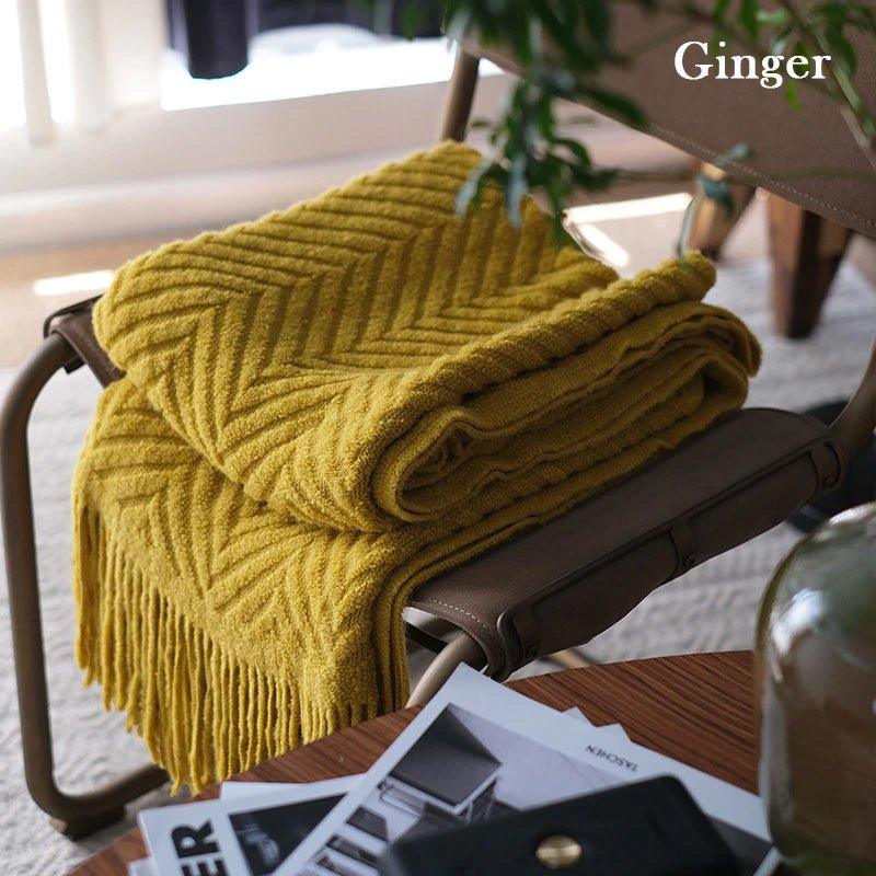 Boon – Gestrickte Überwurfdecken aus Tweed mit Zickzack-Struktur und Quasten