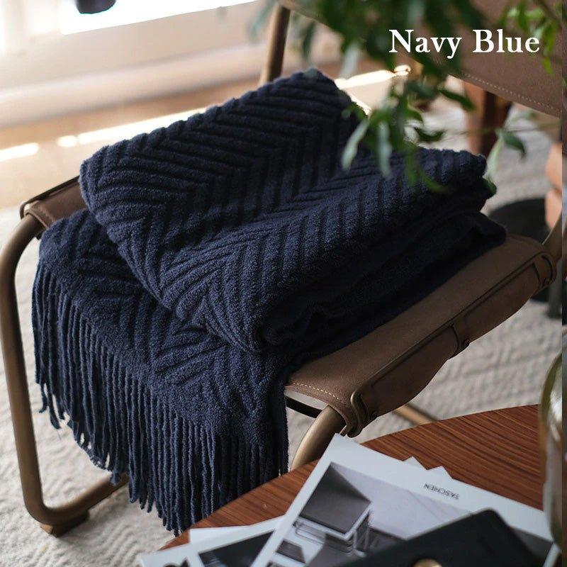 Boon – Gestrickte Überwurfdecken aus Tweed mit Zickzack-Struktur und Quasten
