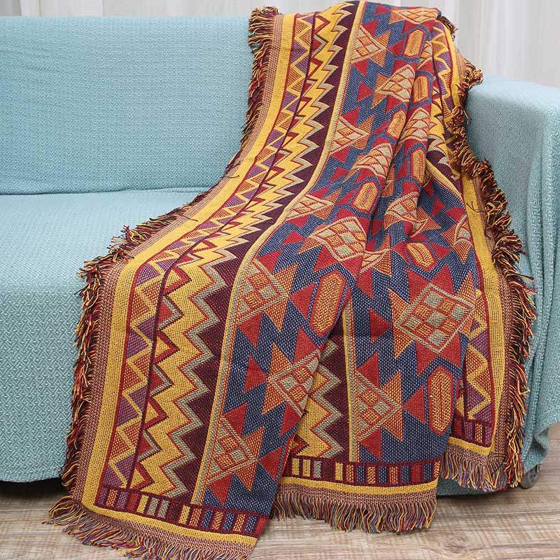 Bohemian Decke mit Quasten und Karomuster in verschiedenen Farben