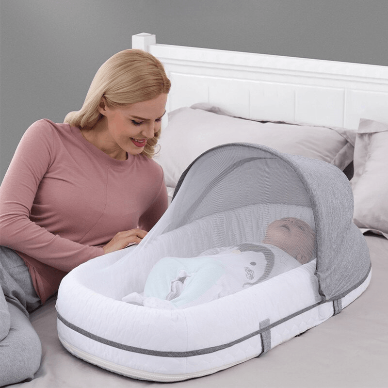 Sandsberg | Mininest - Zusammenklappbares Reisebett für Babys