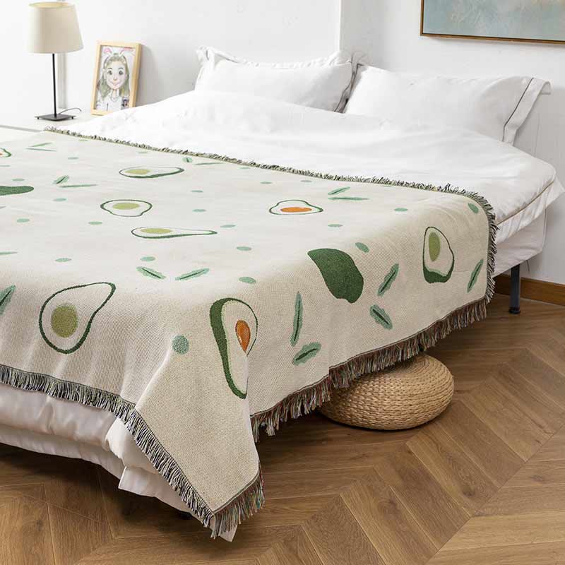 Decke mit Avocado-Print und Quaste
