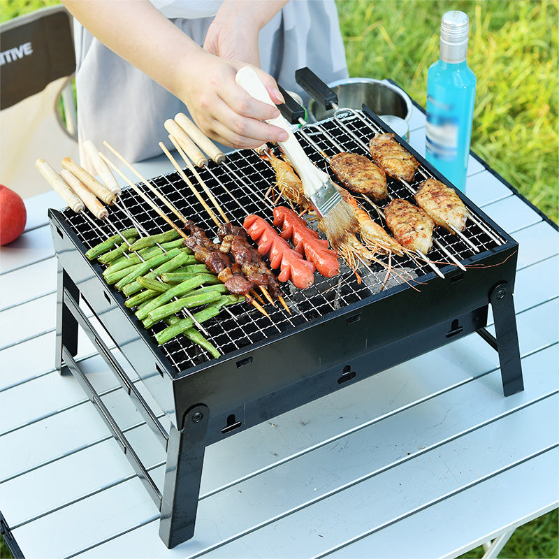 Zusammenklappbarer, tragbarer Grill mit Schublade und Ständer